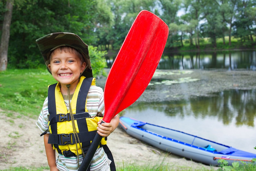 boy kayaking canoeing